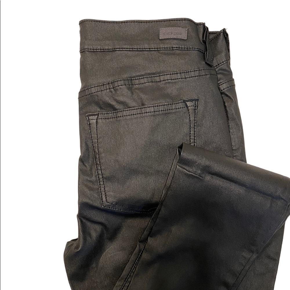 Sneak Peek coated black skinny denim.